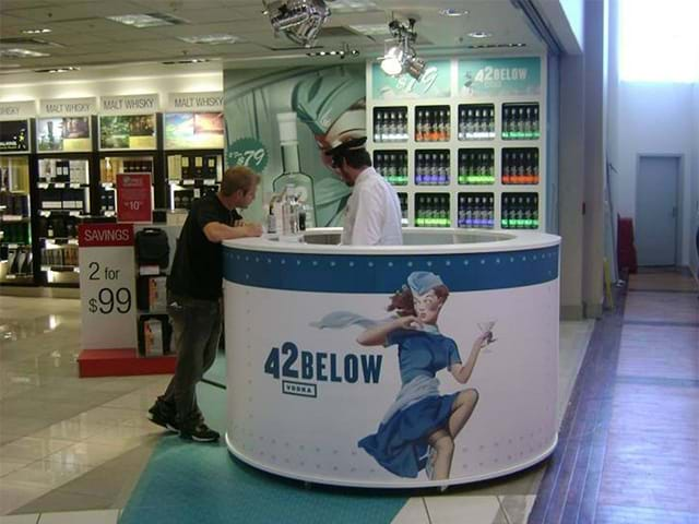 42-below-kiosk-train-carried-bottles-around-the-circumference.jpg