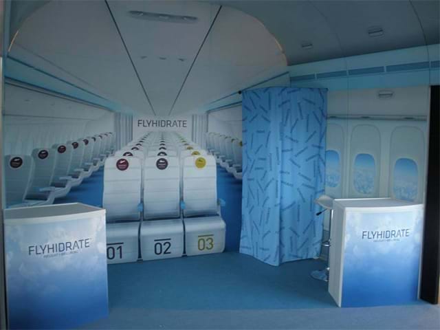 We built an entire display to replicate the inside of a plane cabin - Displays2Go